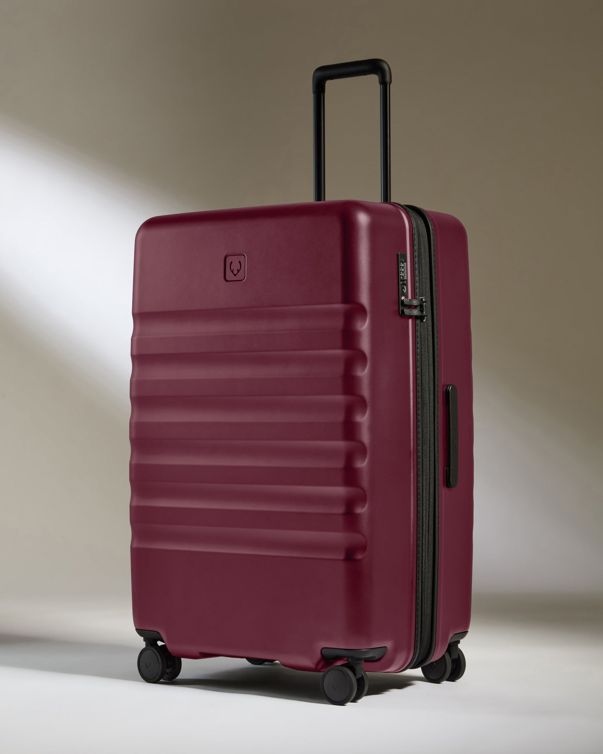 Large Suitcase in Heather Purple Icon Stripe