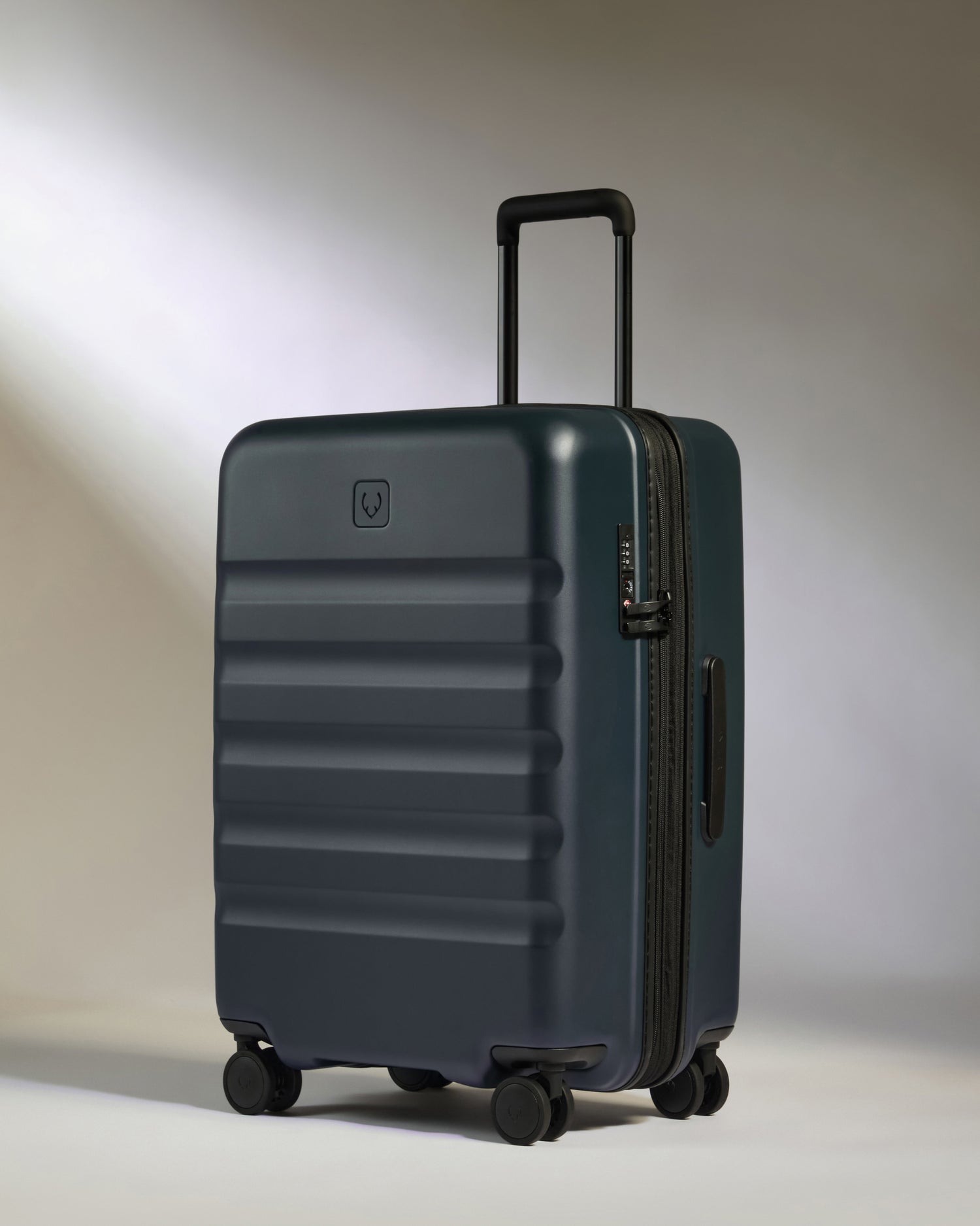 Medium Luggage in Indigo Blue - Icon Stripe