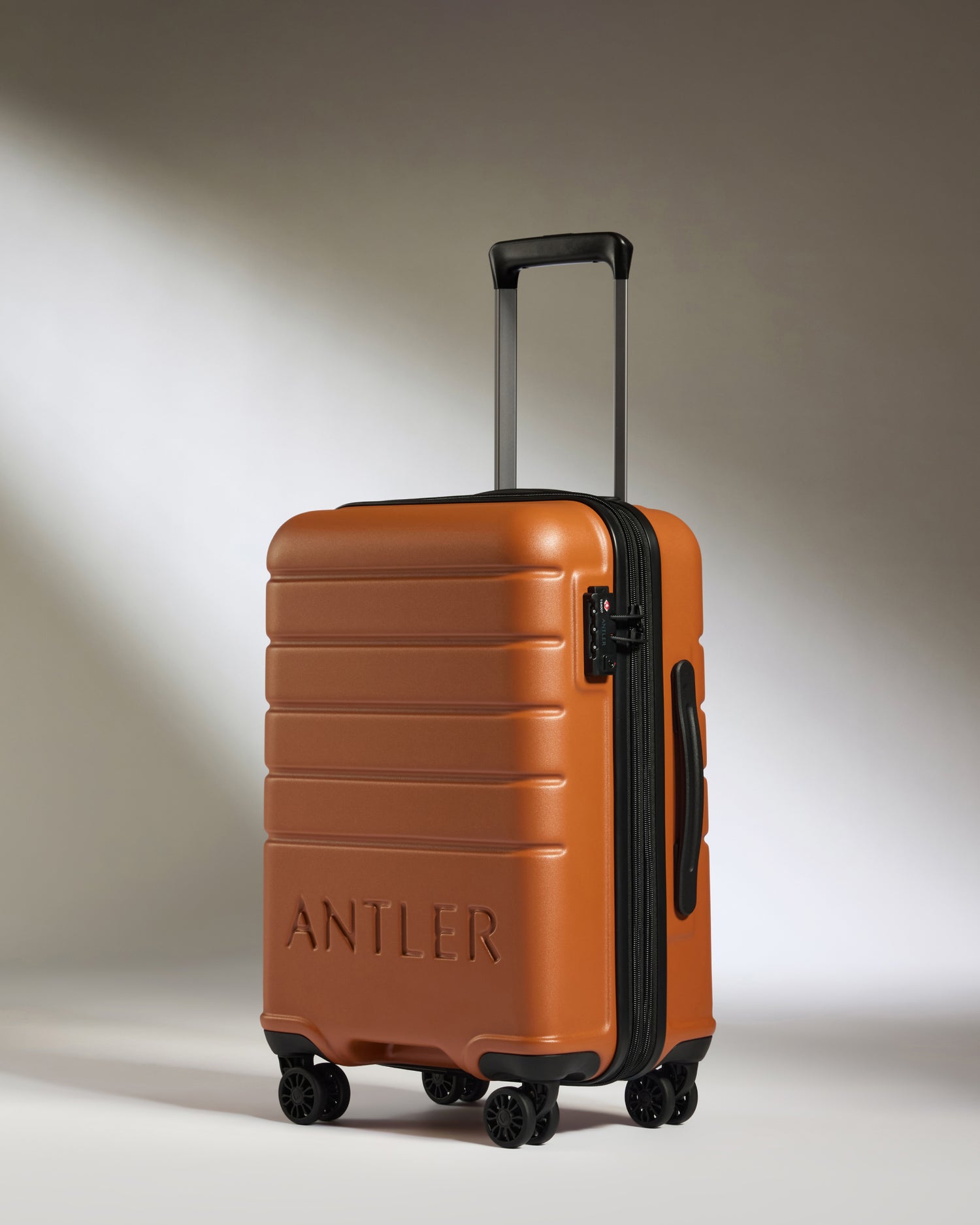 Expandable Carry-on Luggage in Amber - Logo