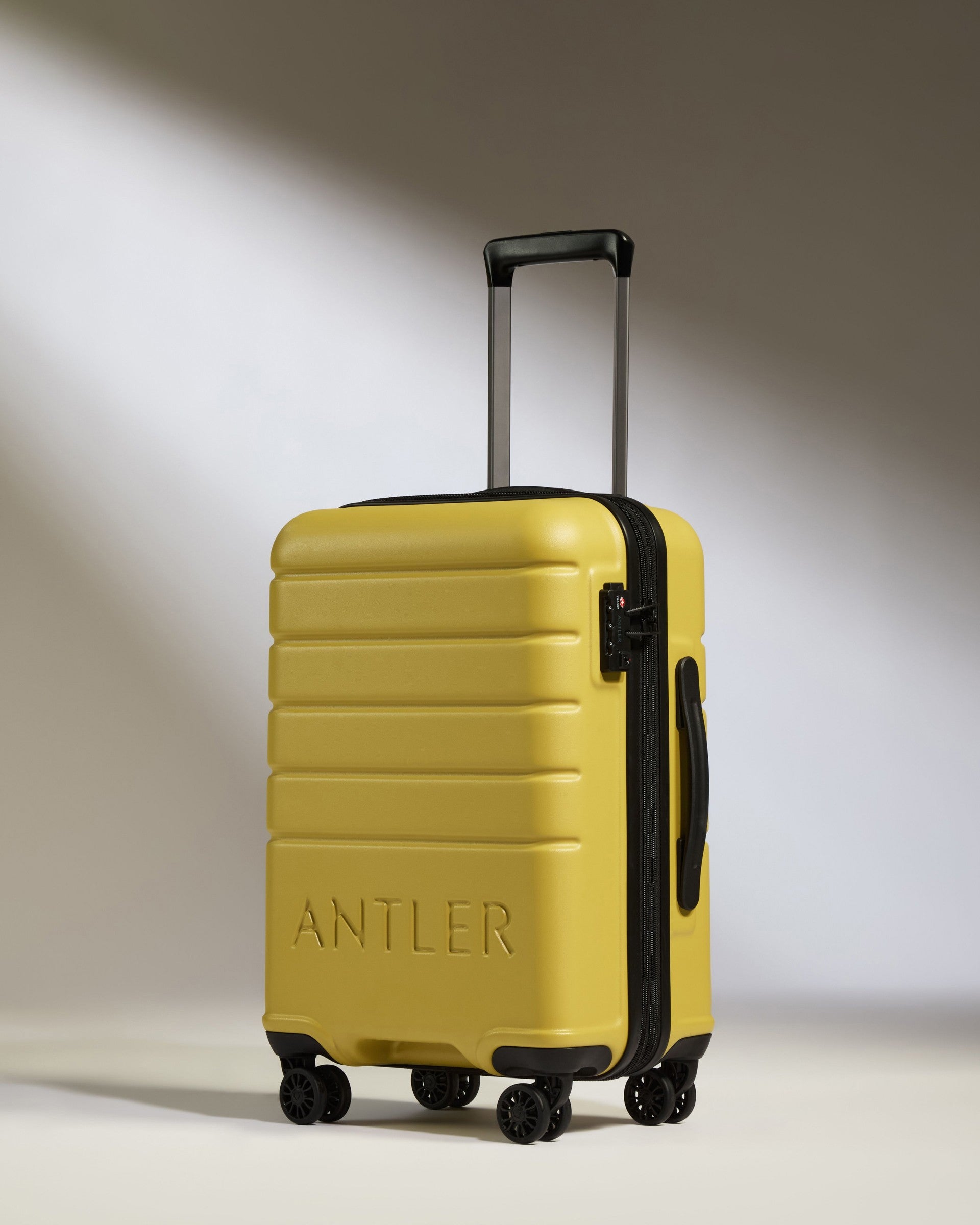 Expandable Carry on Luggage in Yellow Logo Lightweight Hard Shell Luggage Antler Luggage Australia