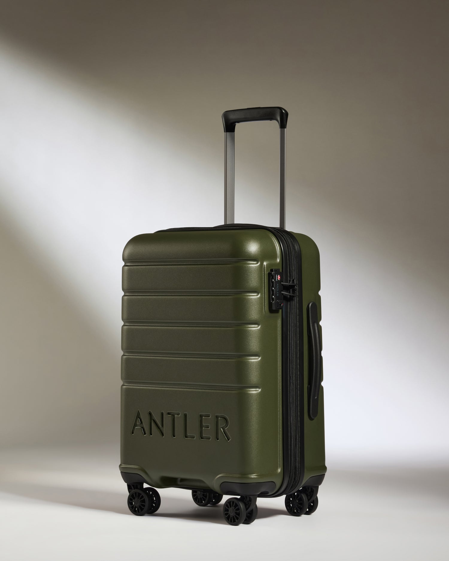 Expandable Carry-on Luggage in Pine - Logo