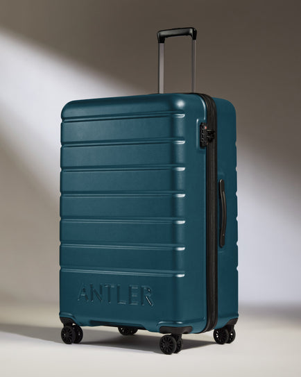 Large Luggage in Soft Blue - Logo