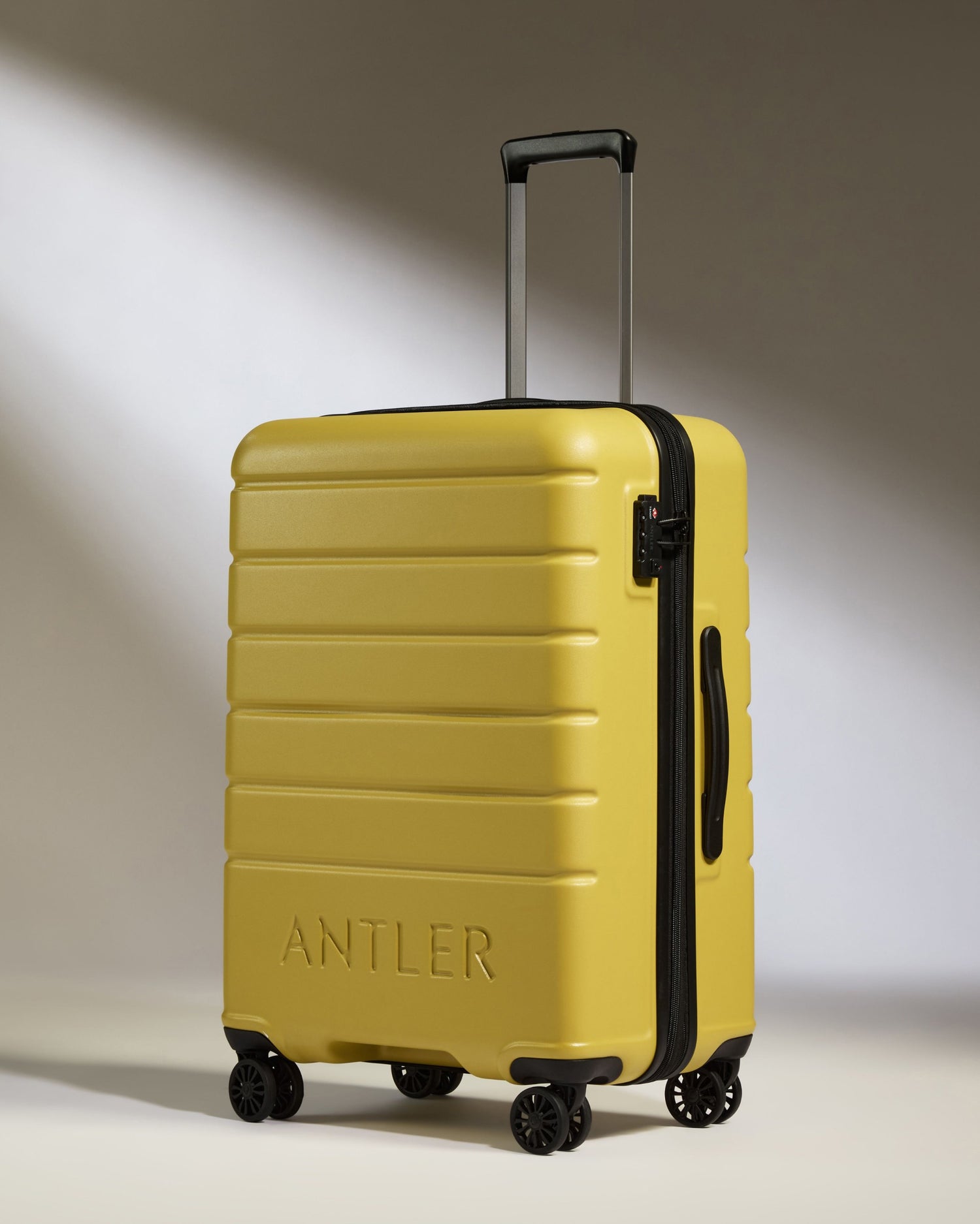 Medium Luggage in Mustard Yellow - Logo