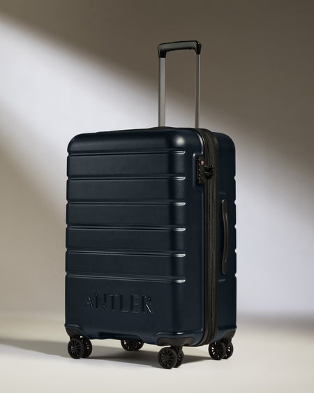 Medium Luggage in Dark Navy - Logo