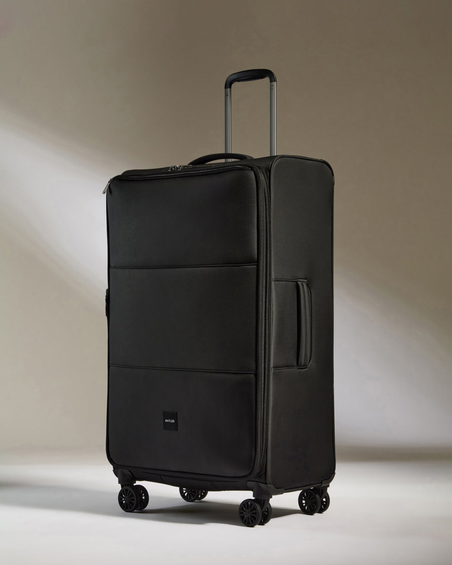 Lightest Large Luggage in Black - Soft Stripe