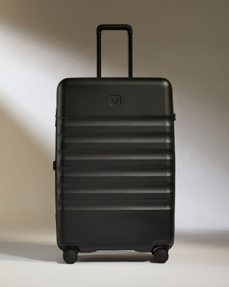 Large Suitcase in Black - Icon Stripe