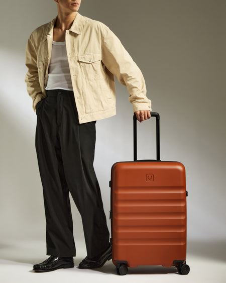 Medium Suitcase in Maple Red - Icon Stripe