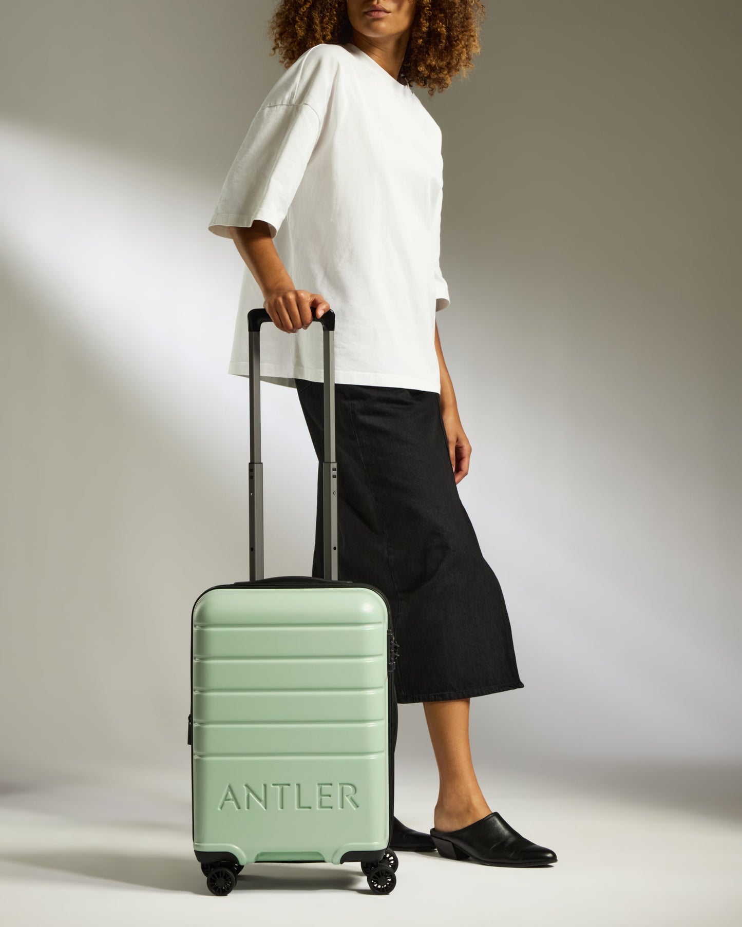 Expandable Carry-on Luggage in Aspen Green - Logo