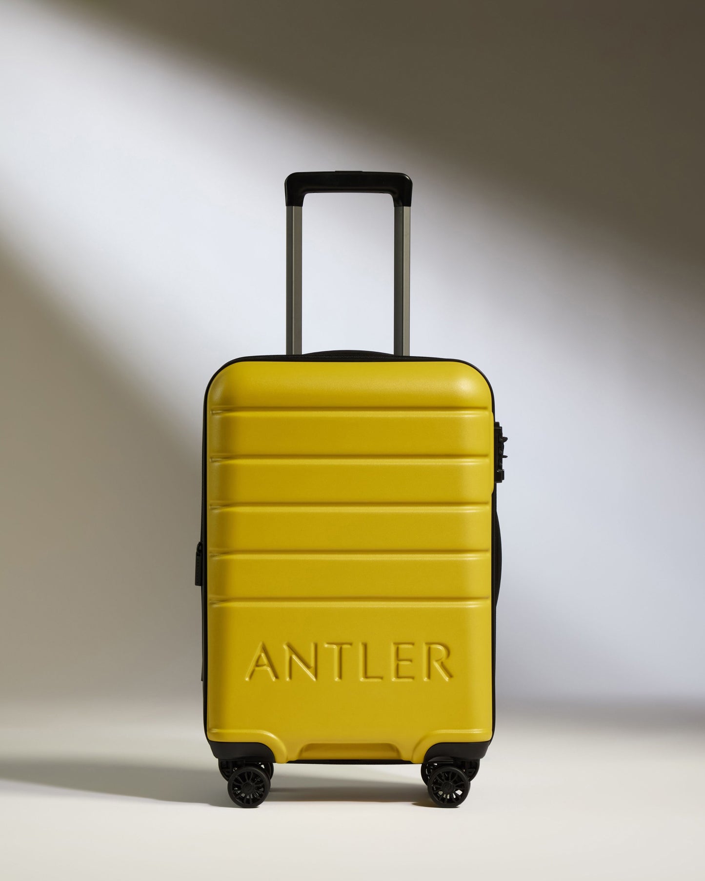 Expandable Carry-on Luggage in Mustard Yellow - Logo