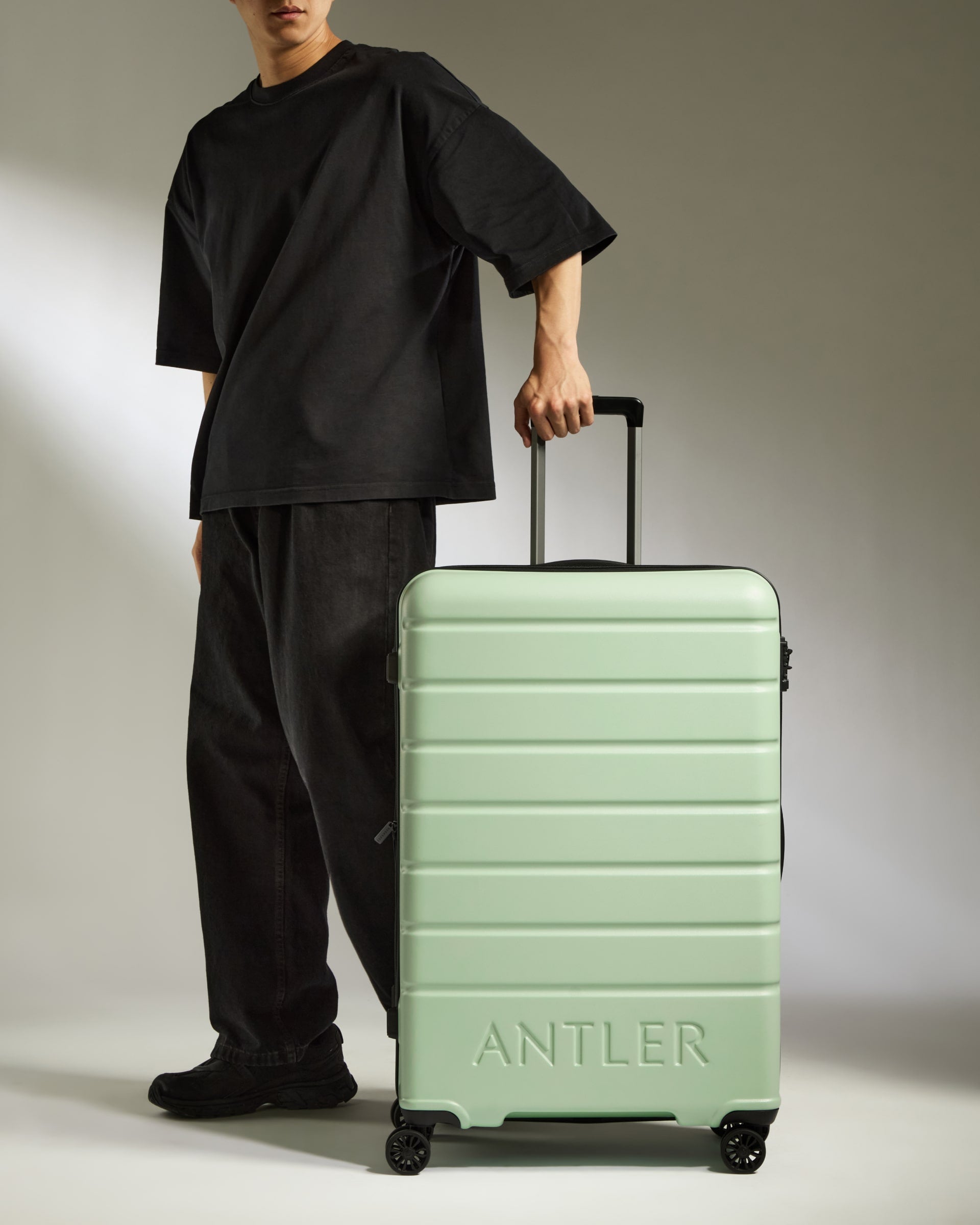 Large Luggage in Light Green Logo Lightweight Hard Shell Suitcase Antler Luggage Australia