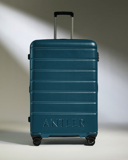 Large Luggage in Soft Blue - Logo