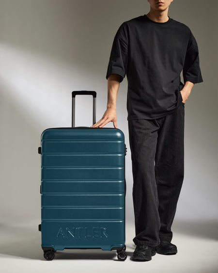 Large Luggage in Soft Blue - Logo