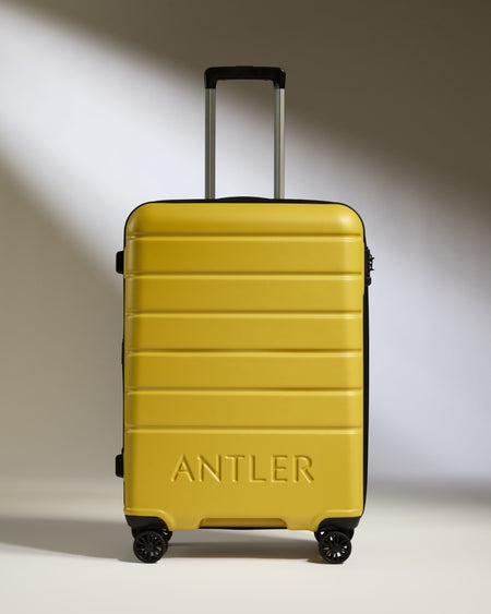 Medium Luggage in Mustard Yellow - Logo