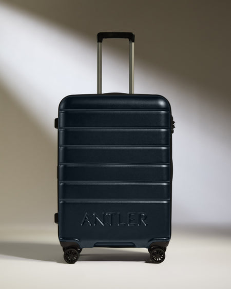 Medium Luggage in Dark Navy - Logo