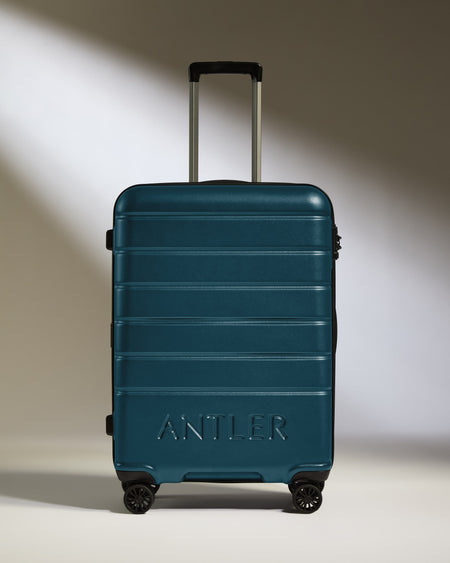 Medium Luggage in Soft Blue - Logo