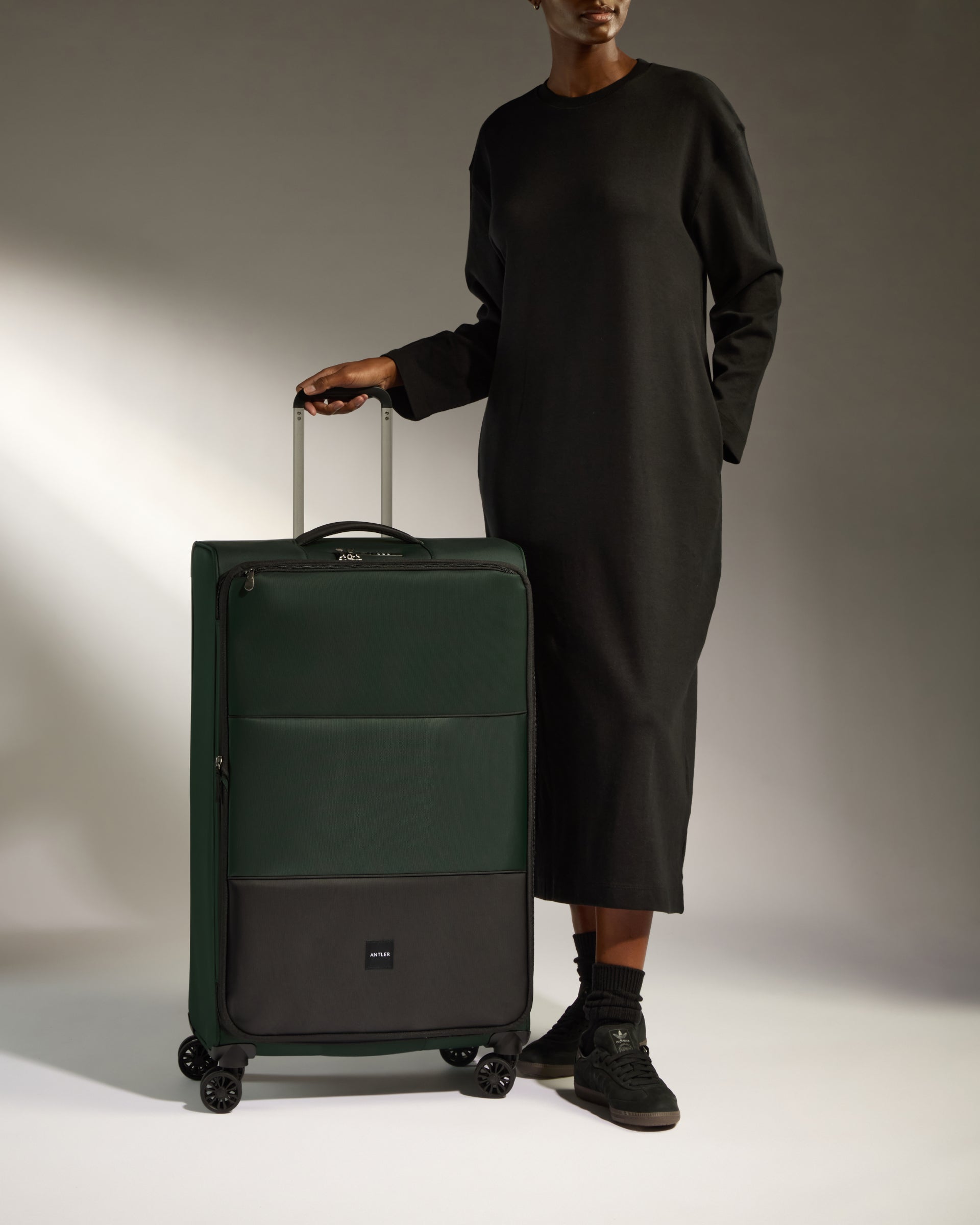 Lightest large suitcase online