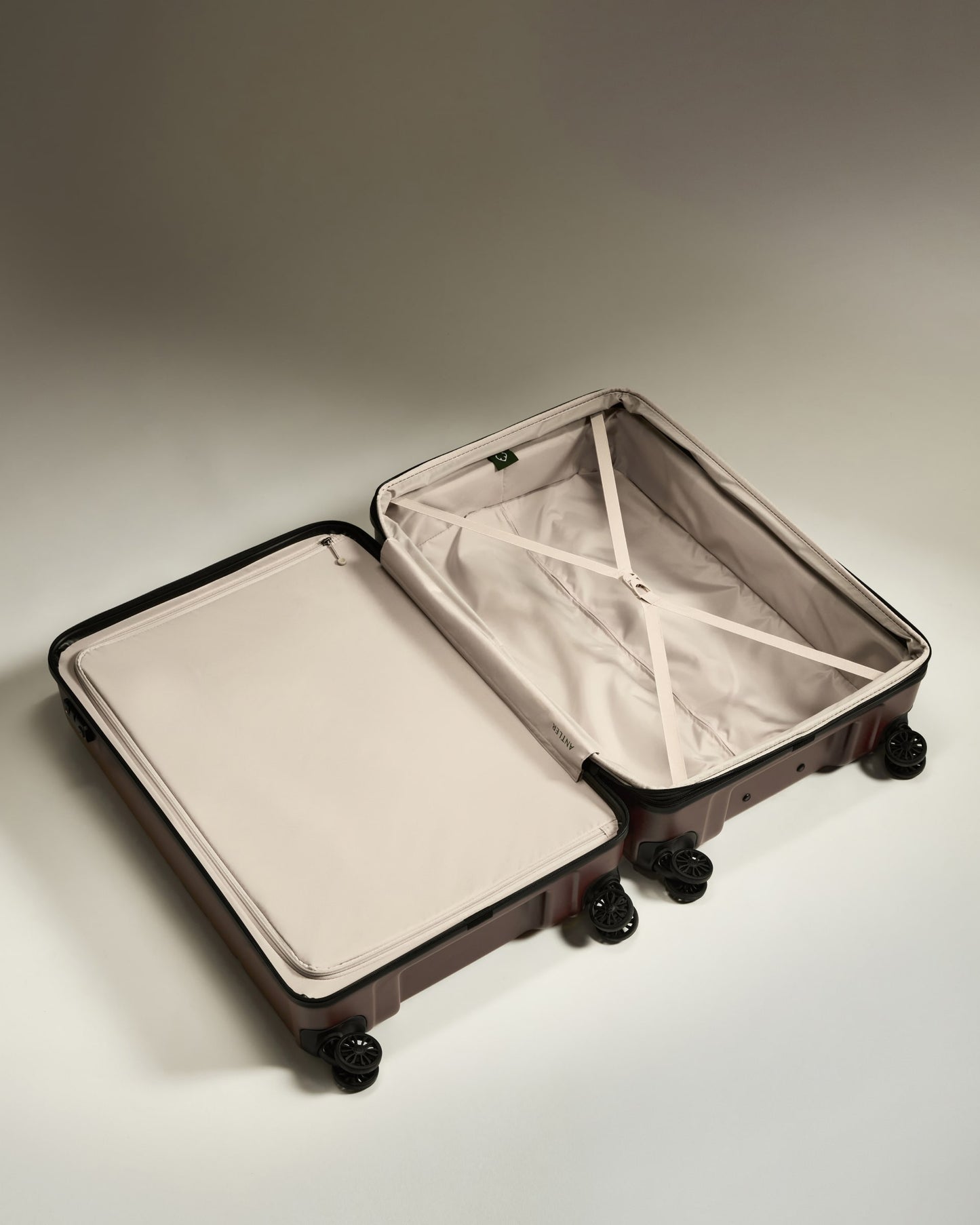 Large Luggage in Cedar Brown - Logo