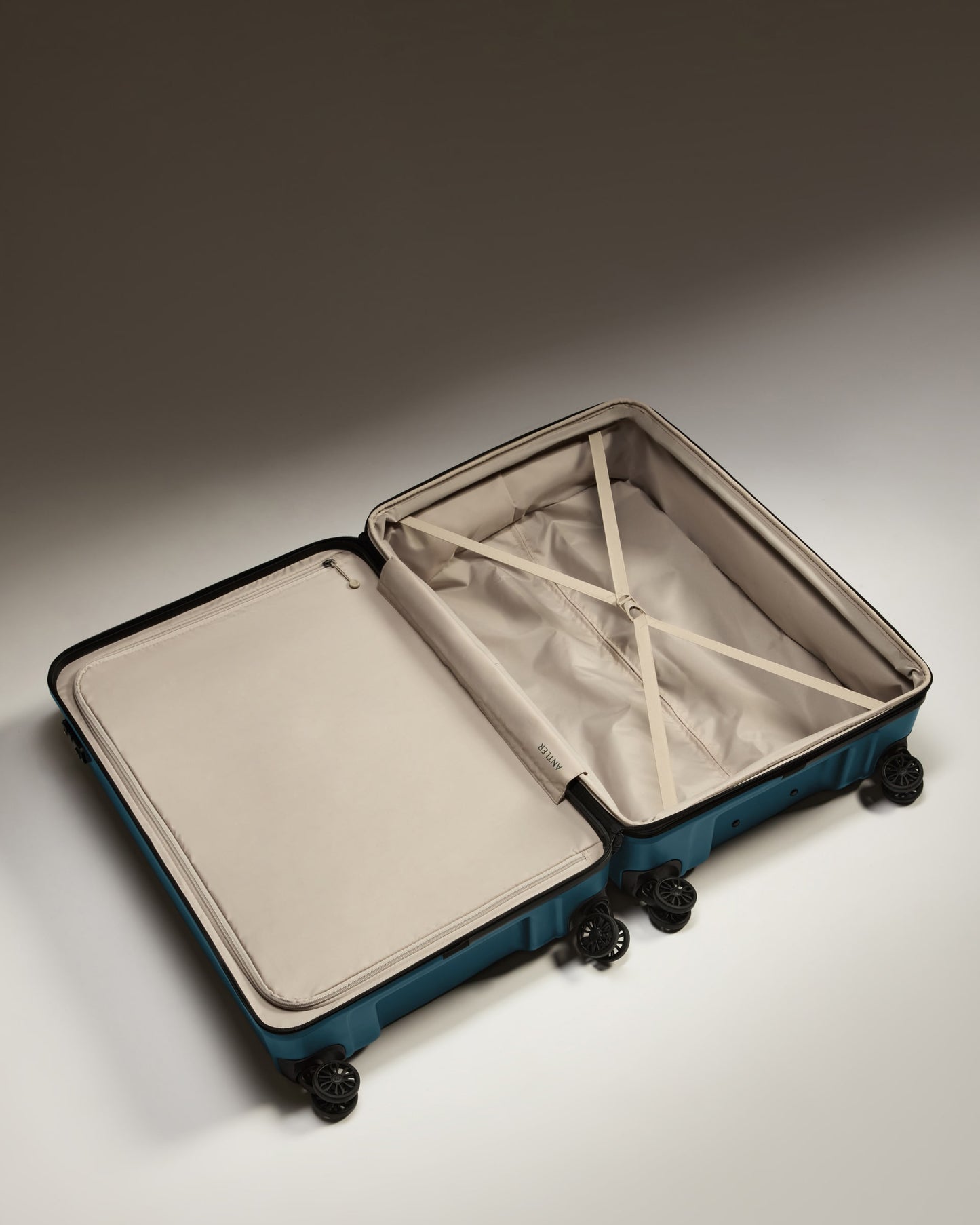 Large Luggage in Soft Blue - Logo