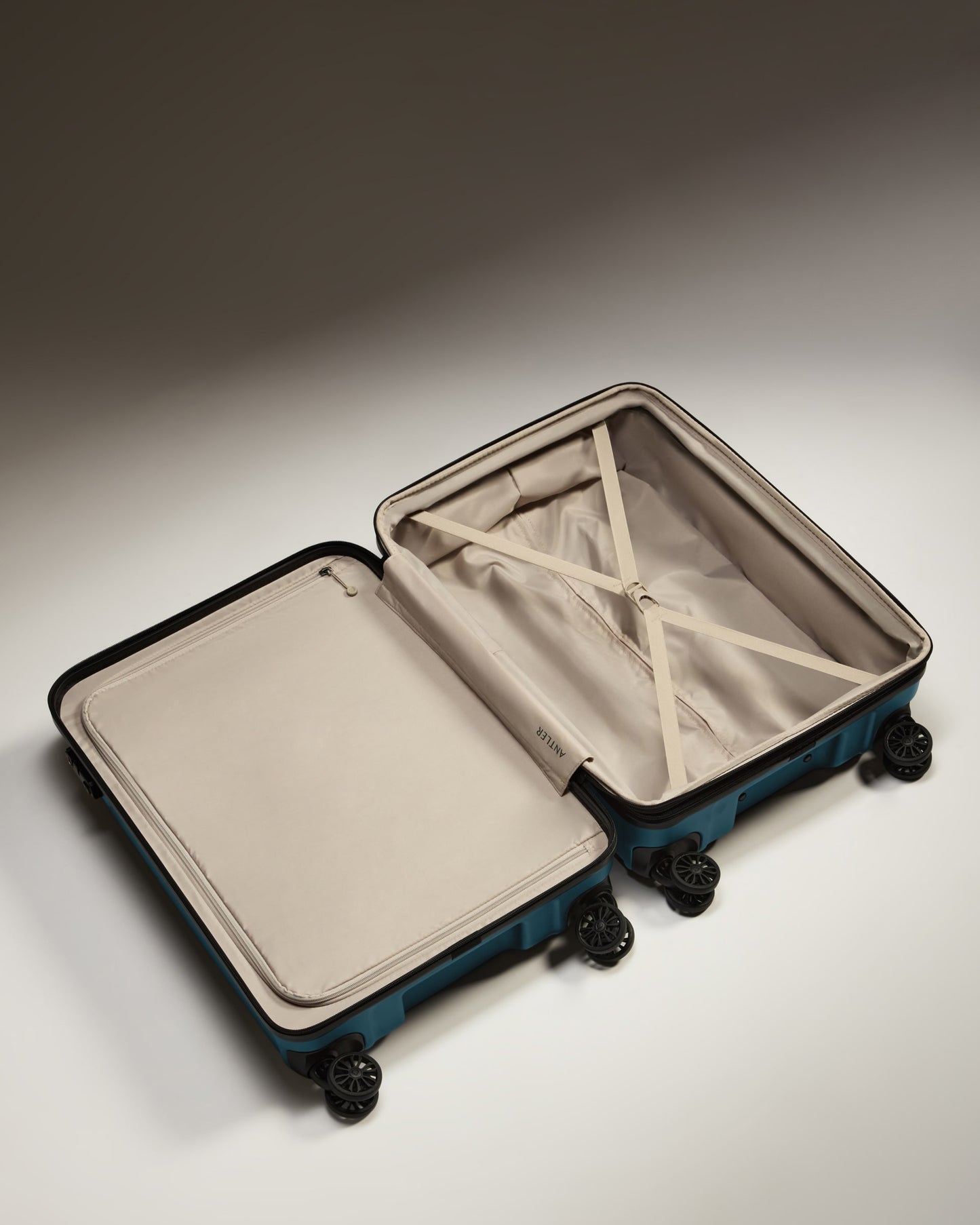 Medium Luggage in Soft Blue - Logo