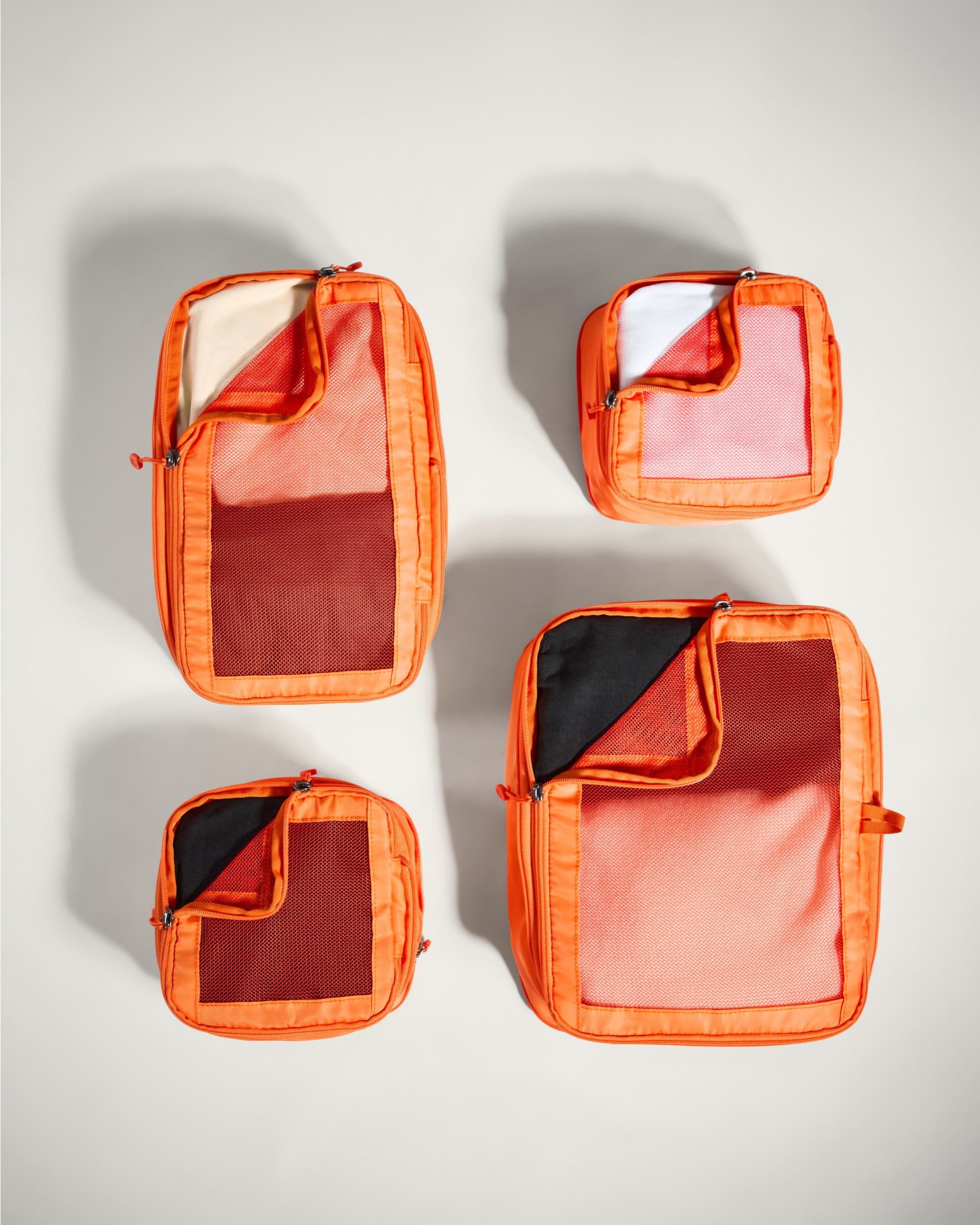 Packing Cubes in Orange Coral Set of 4 Travel Accessories Packing Organiser Antler Luggage Australia