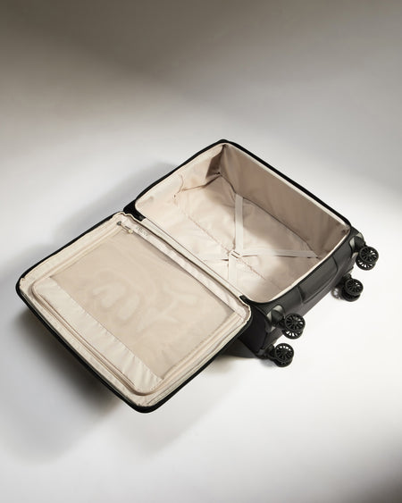 Lightest Medium Luggage in Black - Soft Stripe