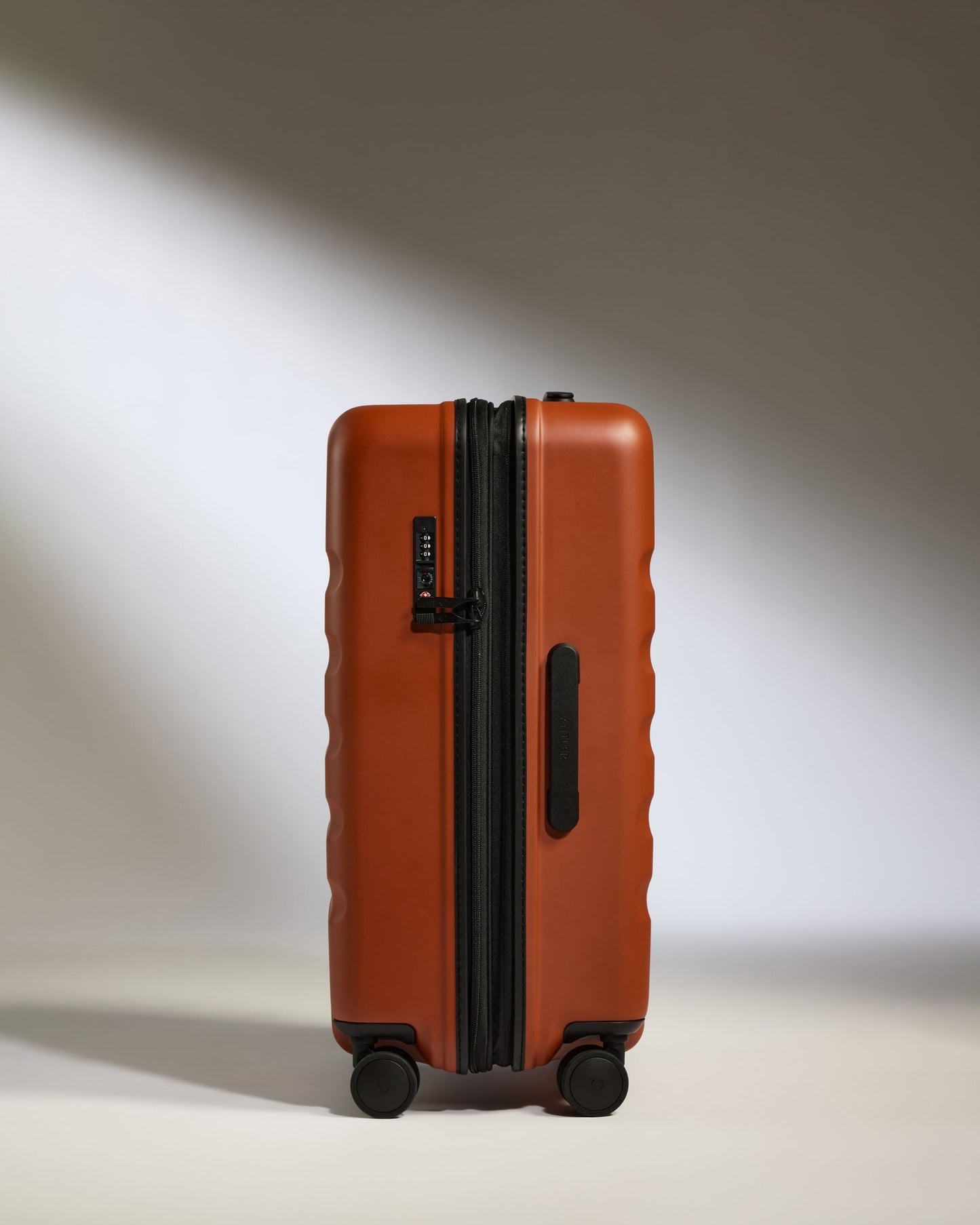 Medium Suitcase in Maple Red - Icon Stripe