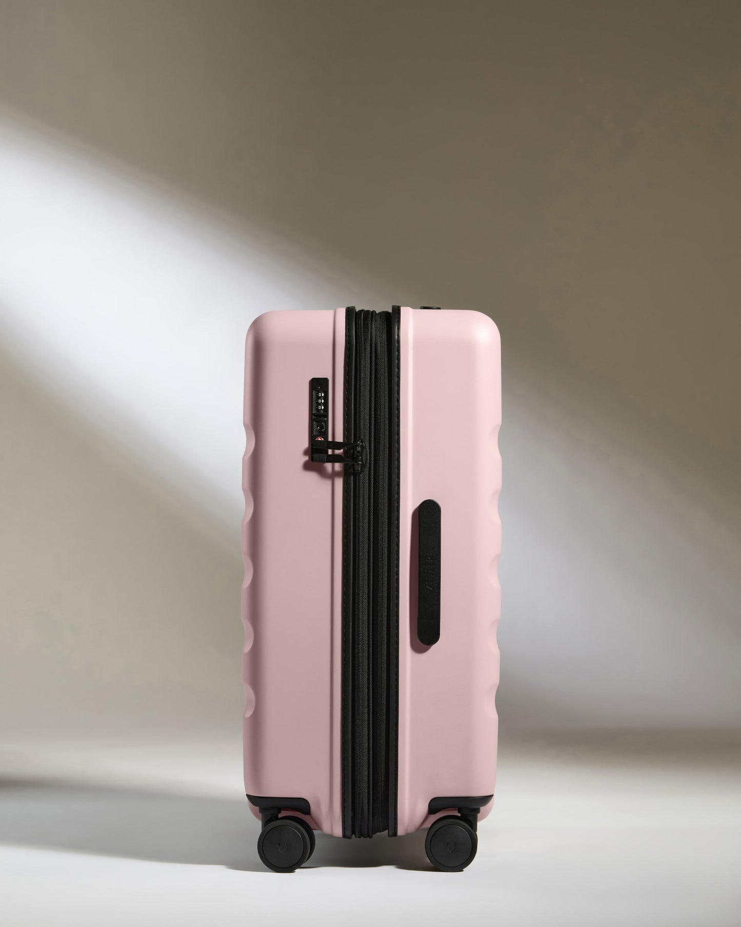 Medium Suitcase in Moorland Pink - Icon Stripe