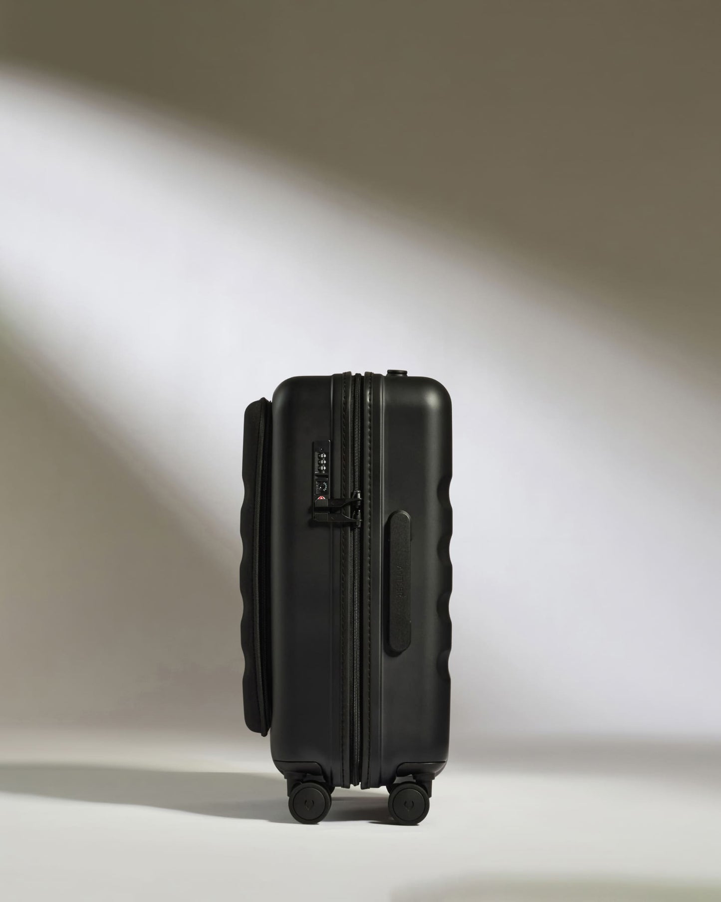 Carry-on with Pocket Luggage in Black - Icon Stripe