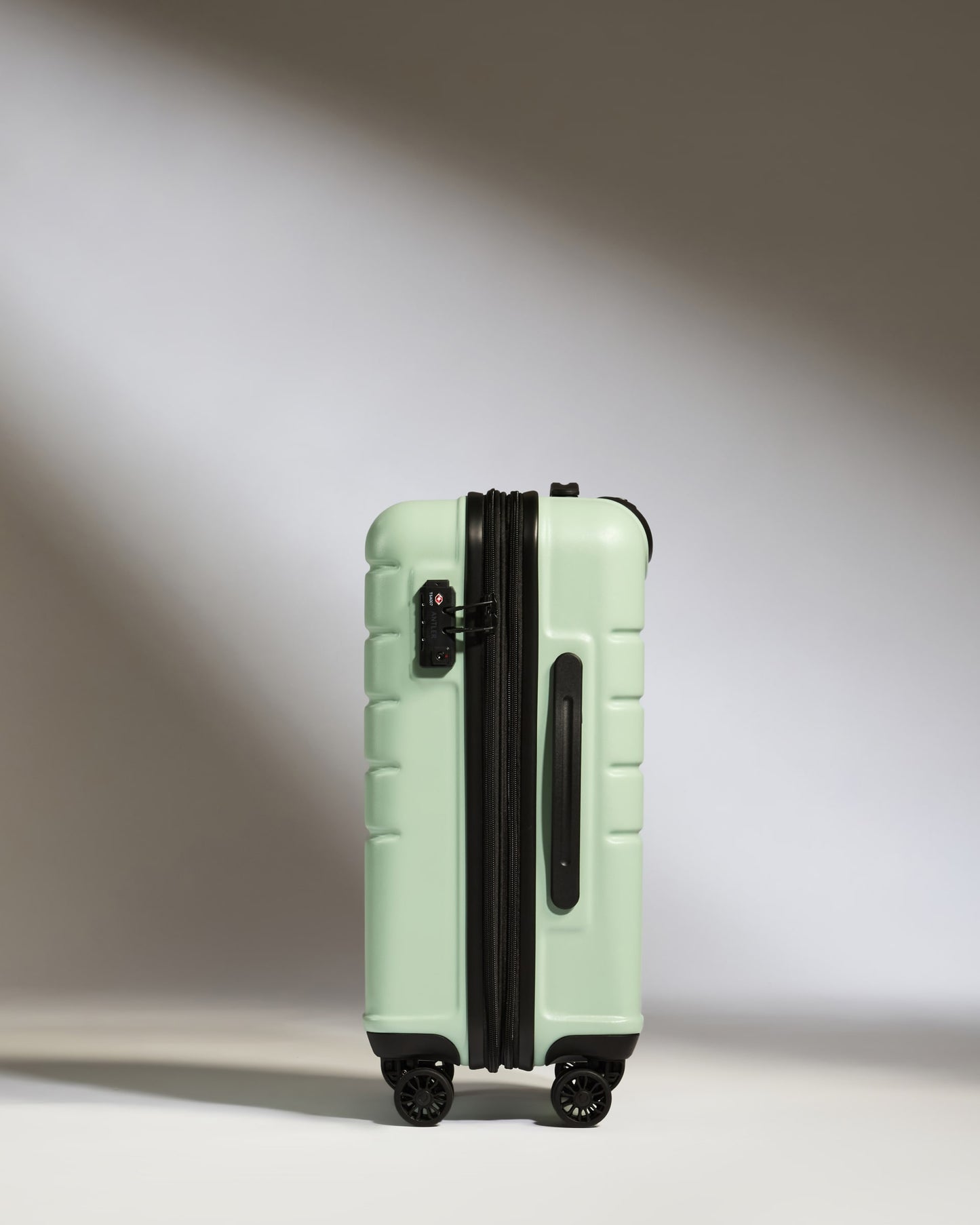 Expandable Carry-on Luggage in Aspen Green - Logo