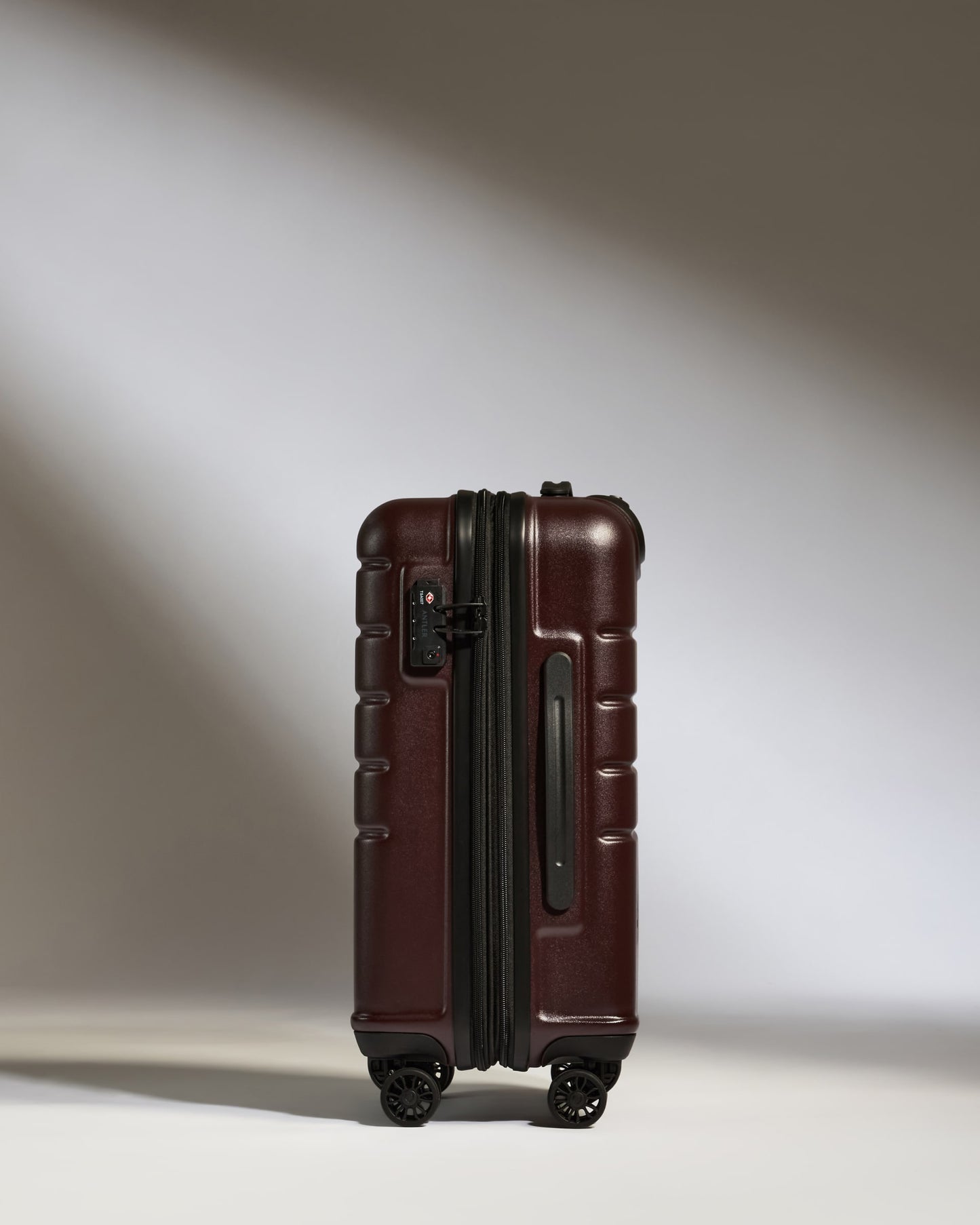 Expandable Carry-on Luggage in Cedar Brown - Logo