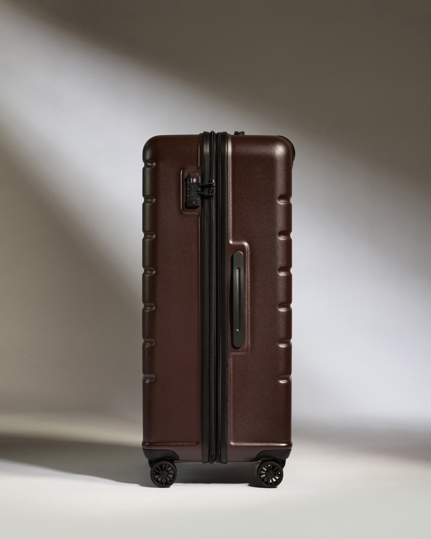 Large Luggage in Cedar Brown - Logo