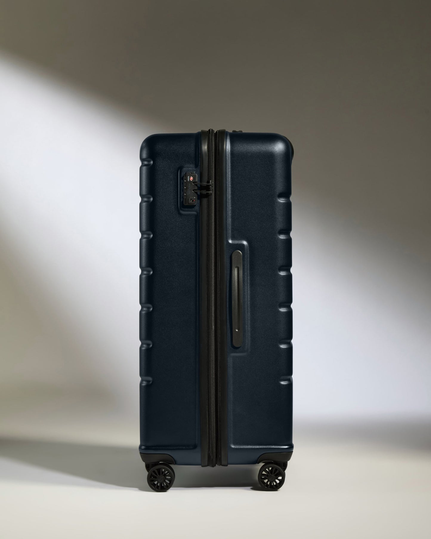 Large Luggage in Dark Navy - Logo