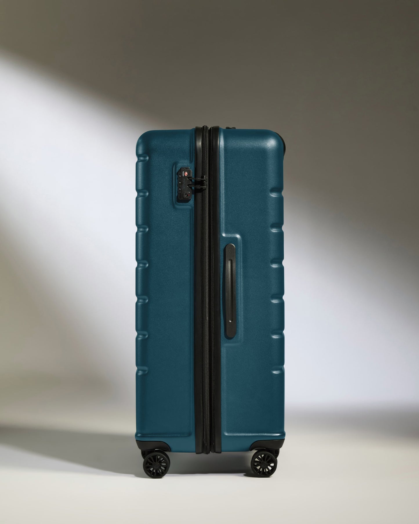 Large Luggage in Soft Blue - Logo