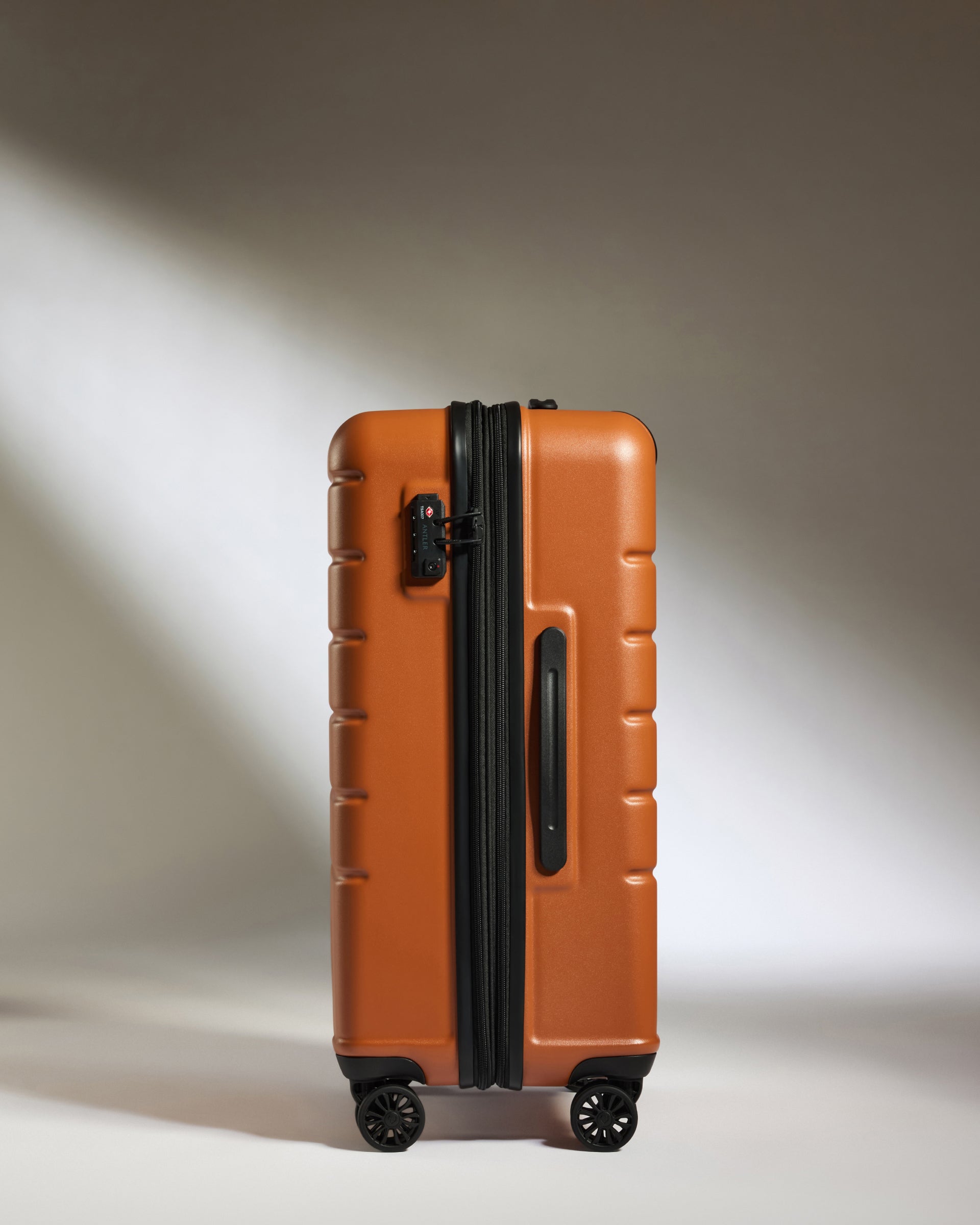 Medium Suitcase in Amber Logo Lightweight Hard Shell Luggage Antler Luggage Australia