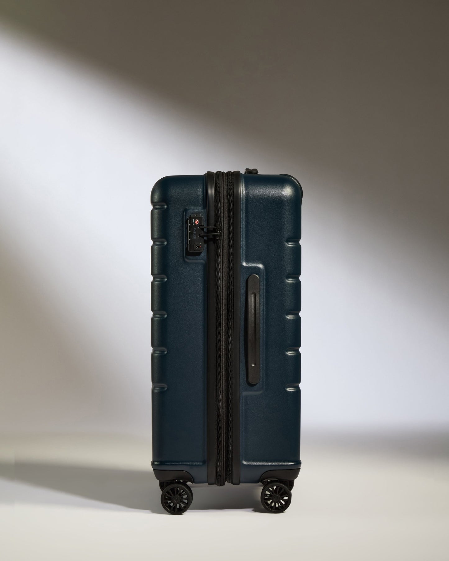 Medium Luggage in Midnight Blue - Logo