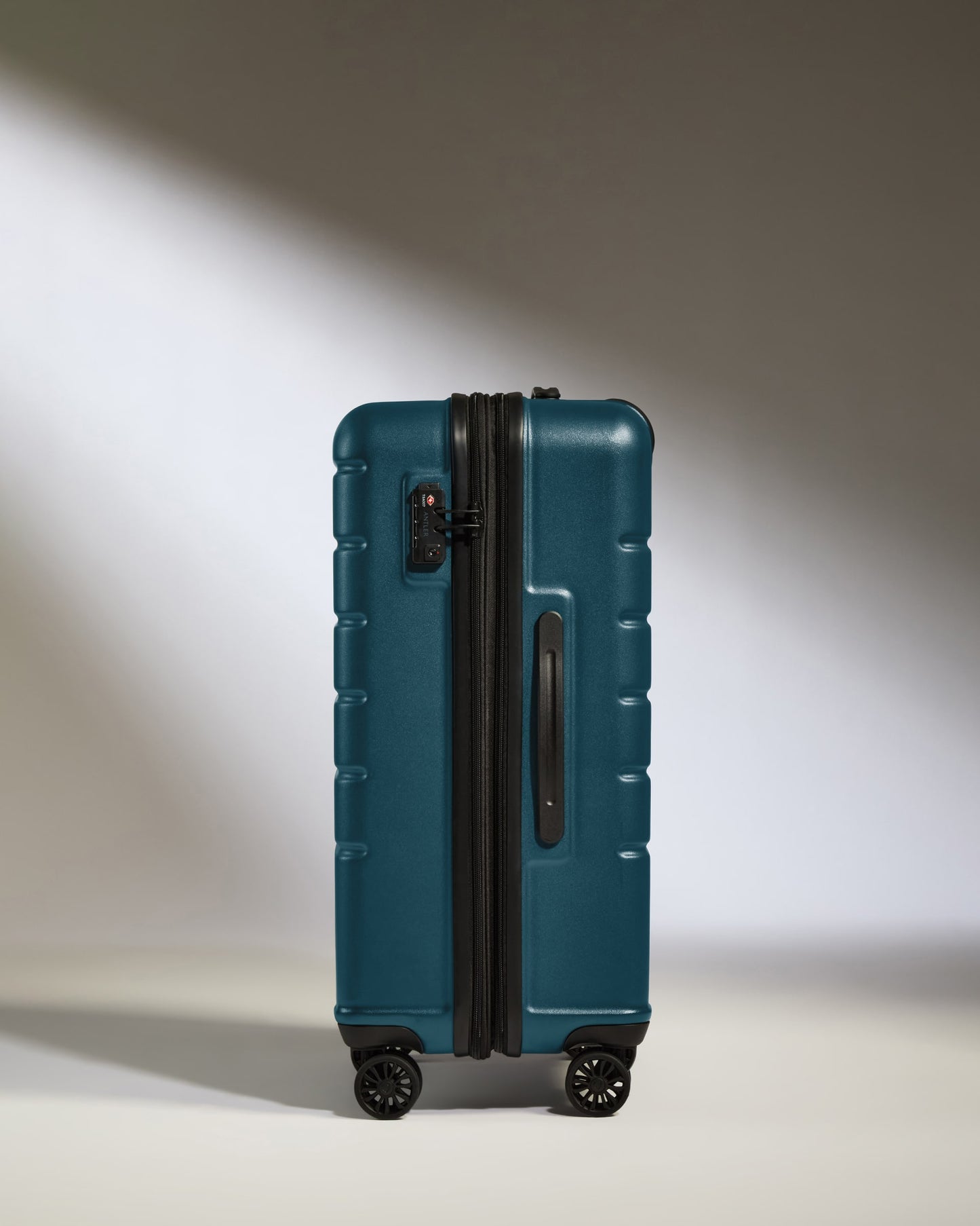 Medium Luggage in Soft Blue - Logo