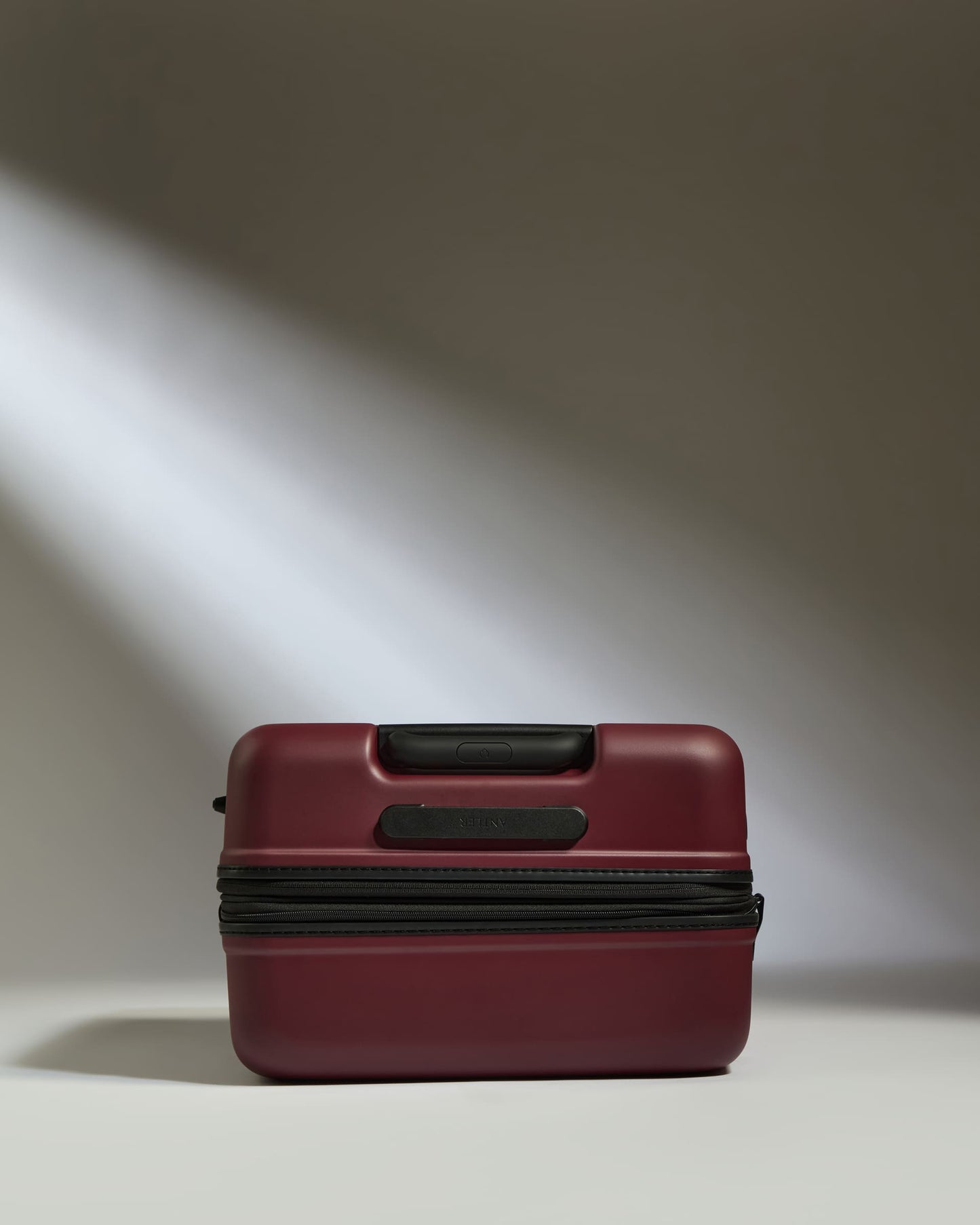 Medium Luggage in Cedar Red - Icon Stripe