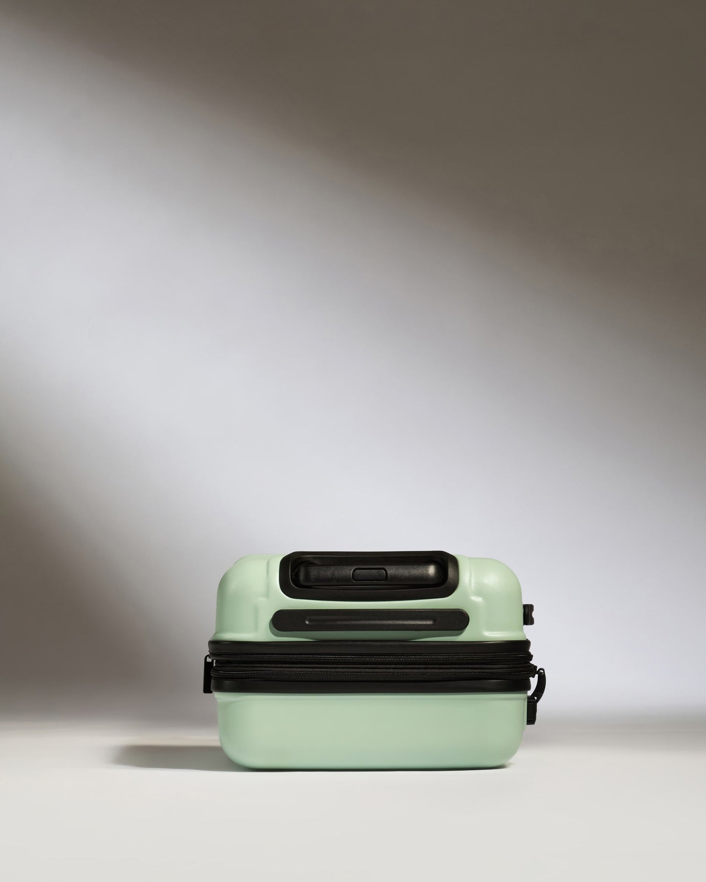 Expandable Carry-on Luggage in Aspen Green - Logo