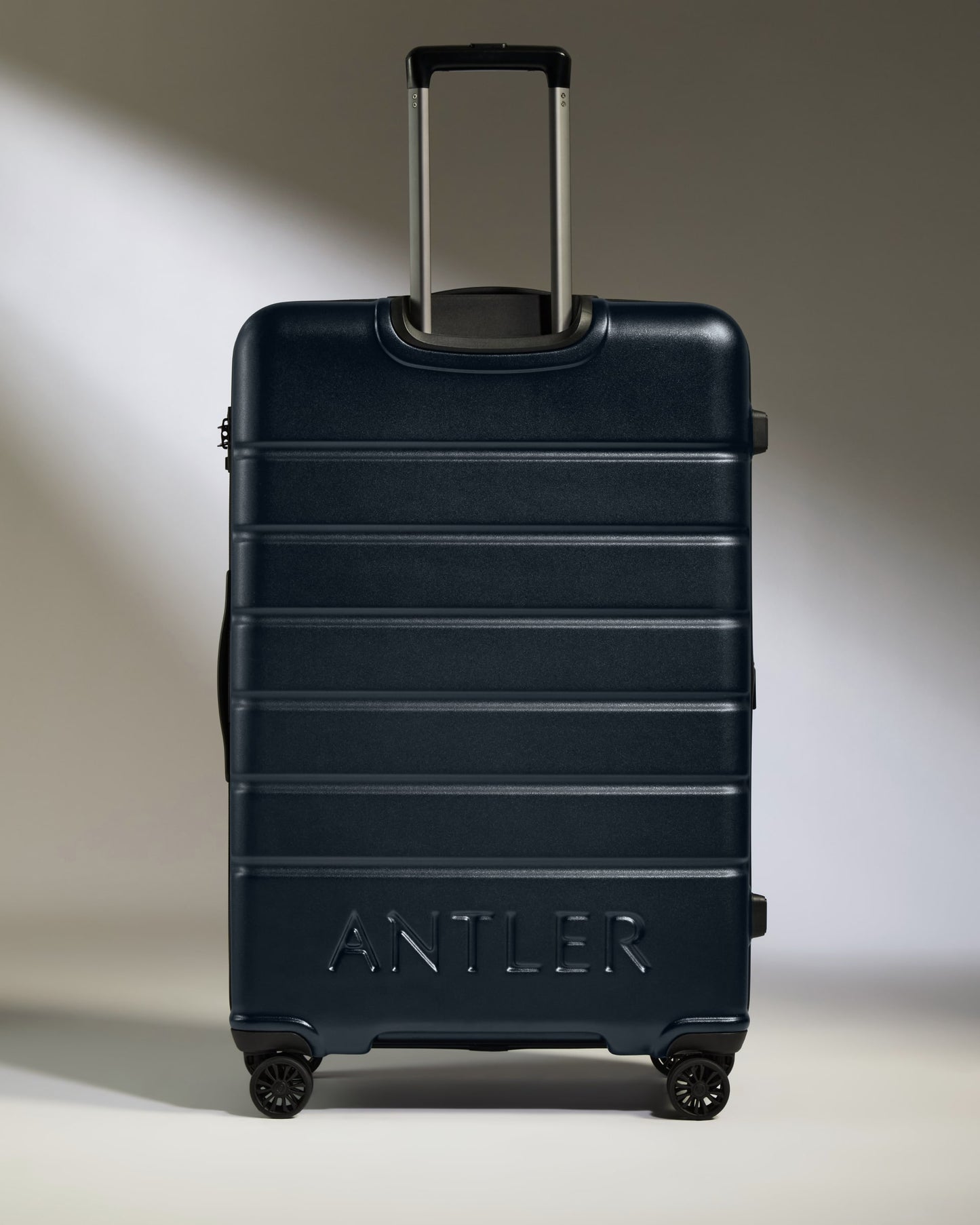 Large Luggage in Dark Navy - Logo