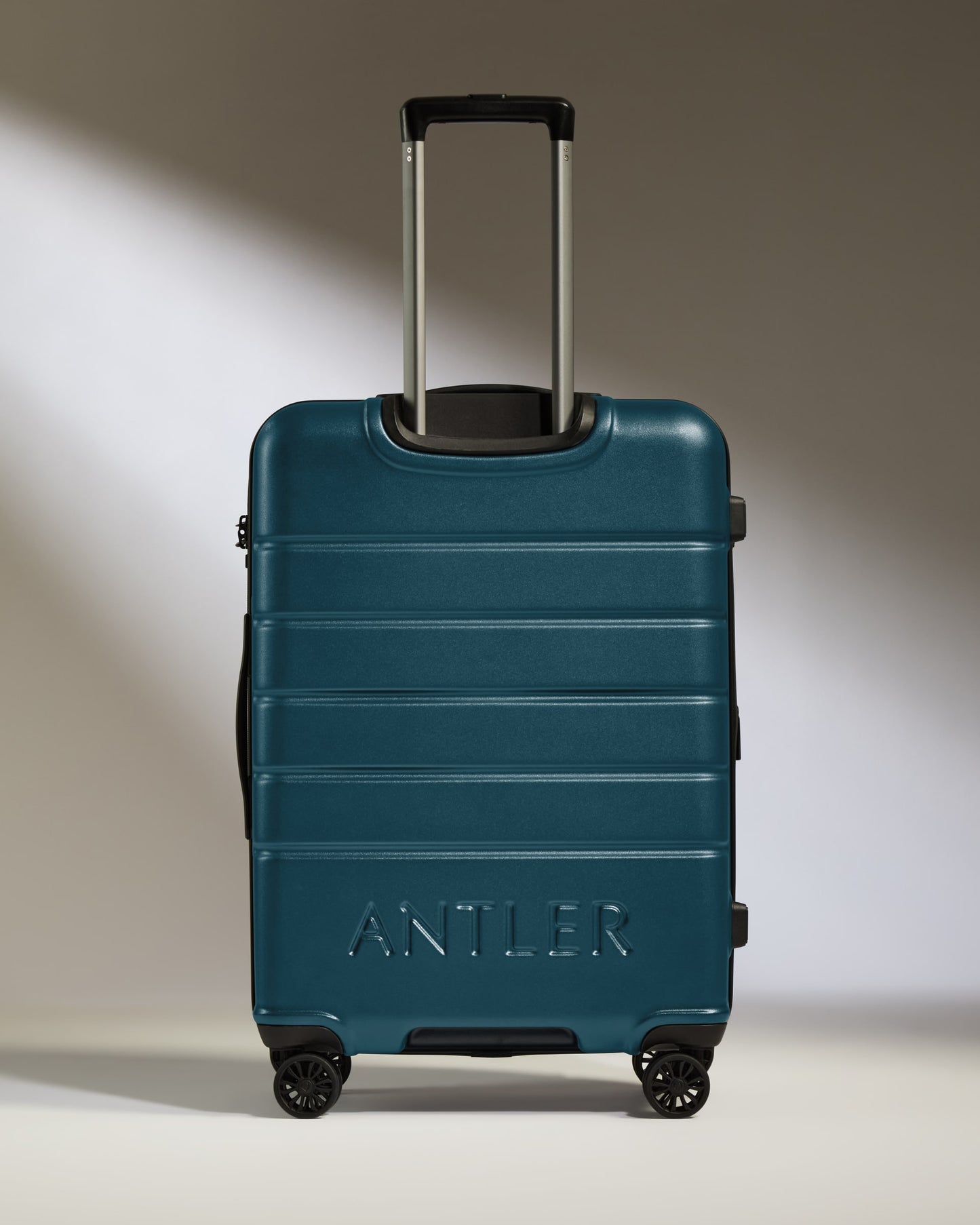 Medium Luggage in Soft Blue - Logo