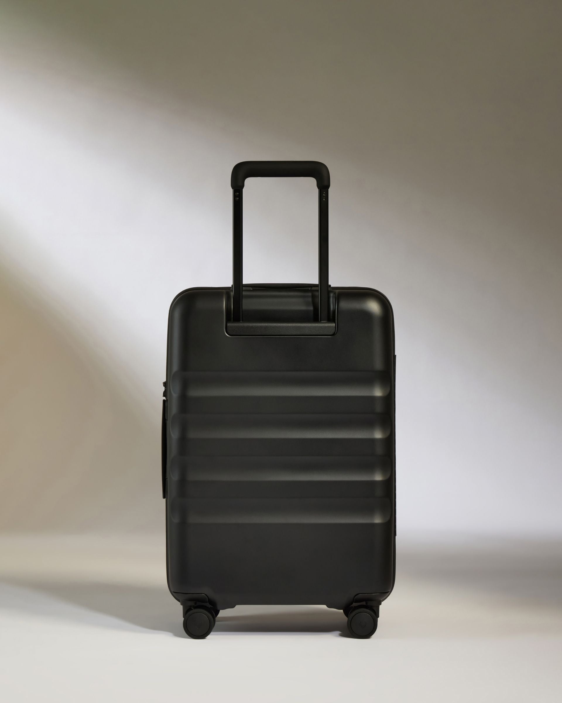 Large Carry on Luggage in Black Icon Stripe Lightweight Hard Shell Suitcase Antler Luggage Australia