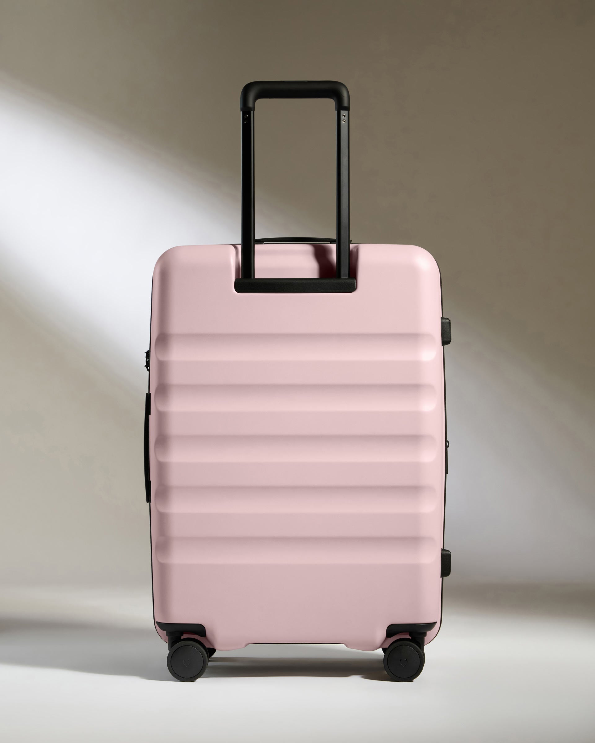 Medium Suitcase in Pink - Icon Stripe | Lightweight & Hard Shell ...