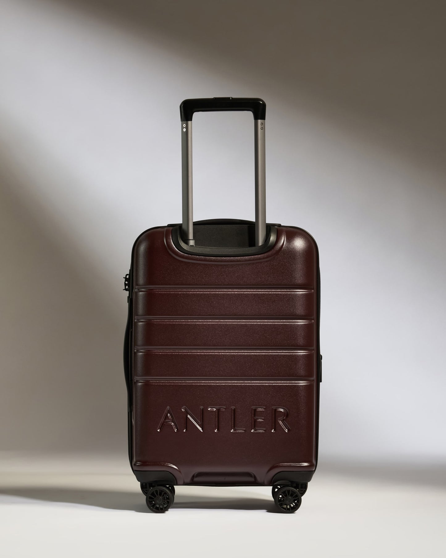 Expandable Carry-on Luggage in Cedar Brown - Logo