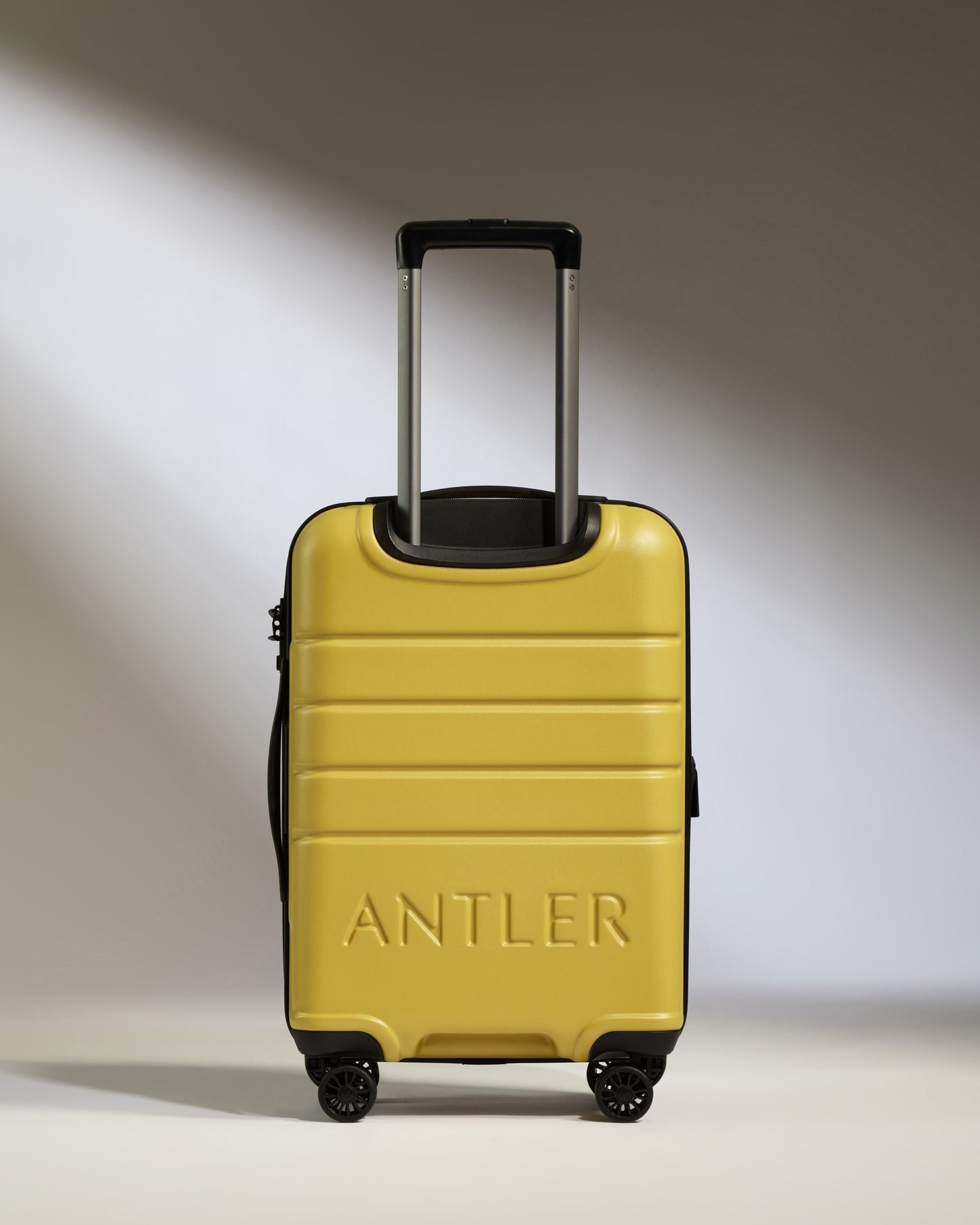 Expandable Carry-on Luggage in Mustard Yellow - Logo