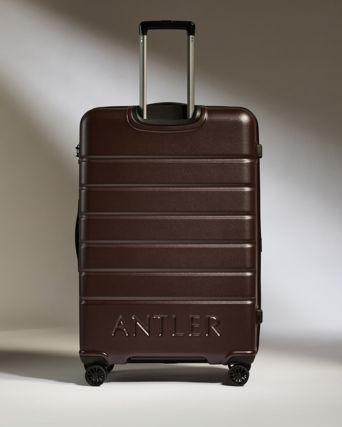 Large Luggage in Cedar Brown - Logo