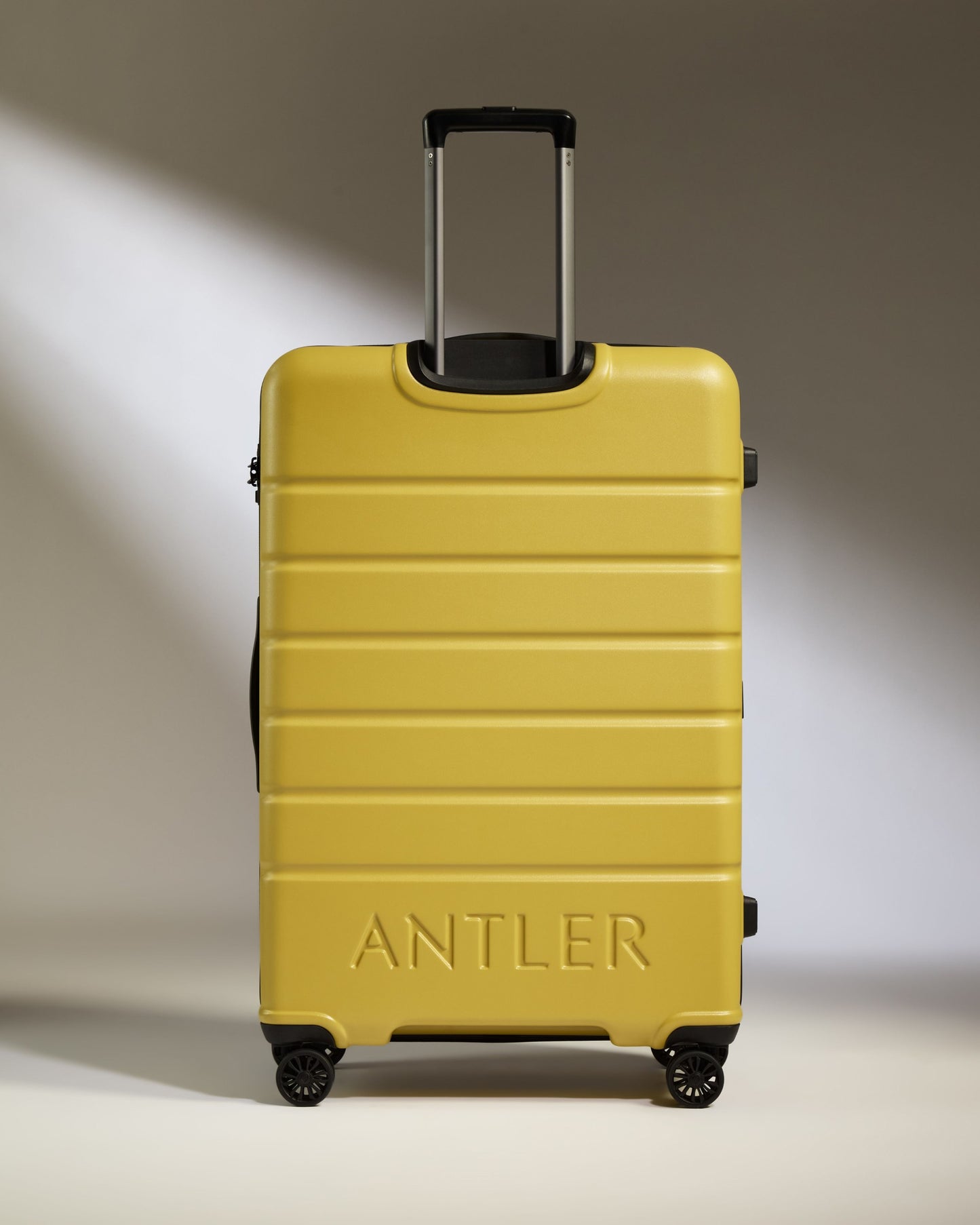 Large Suitcase in Mustard Yellow - Logo