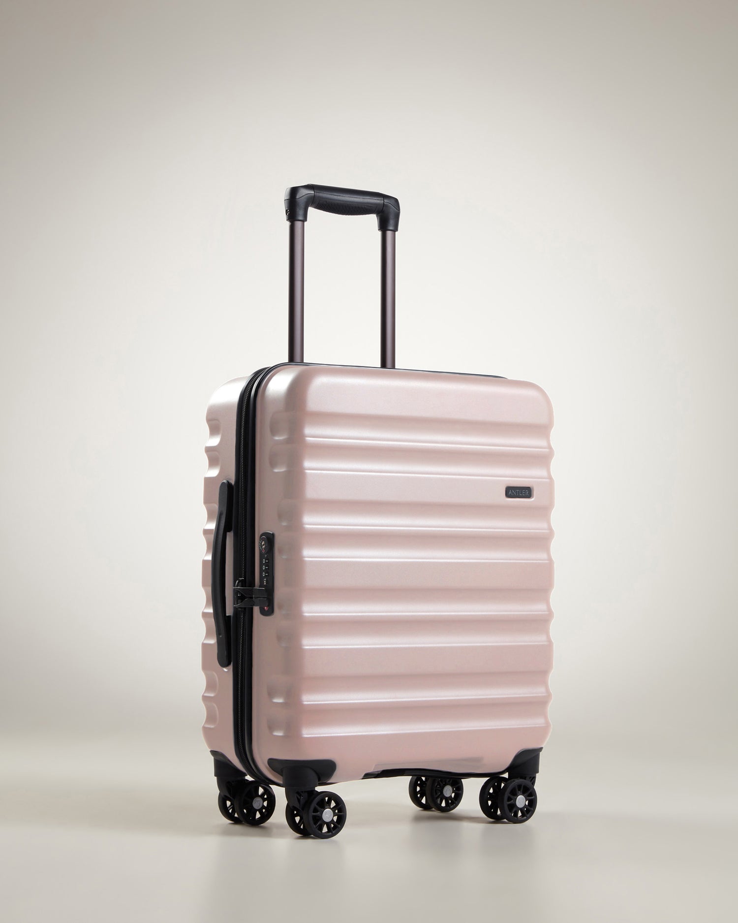 Expandable Carry-on Luggage in Blush - Clifton