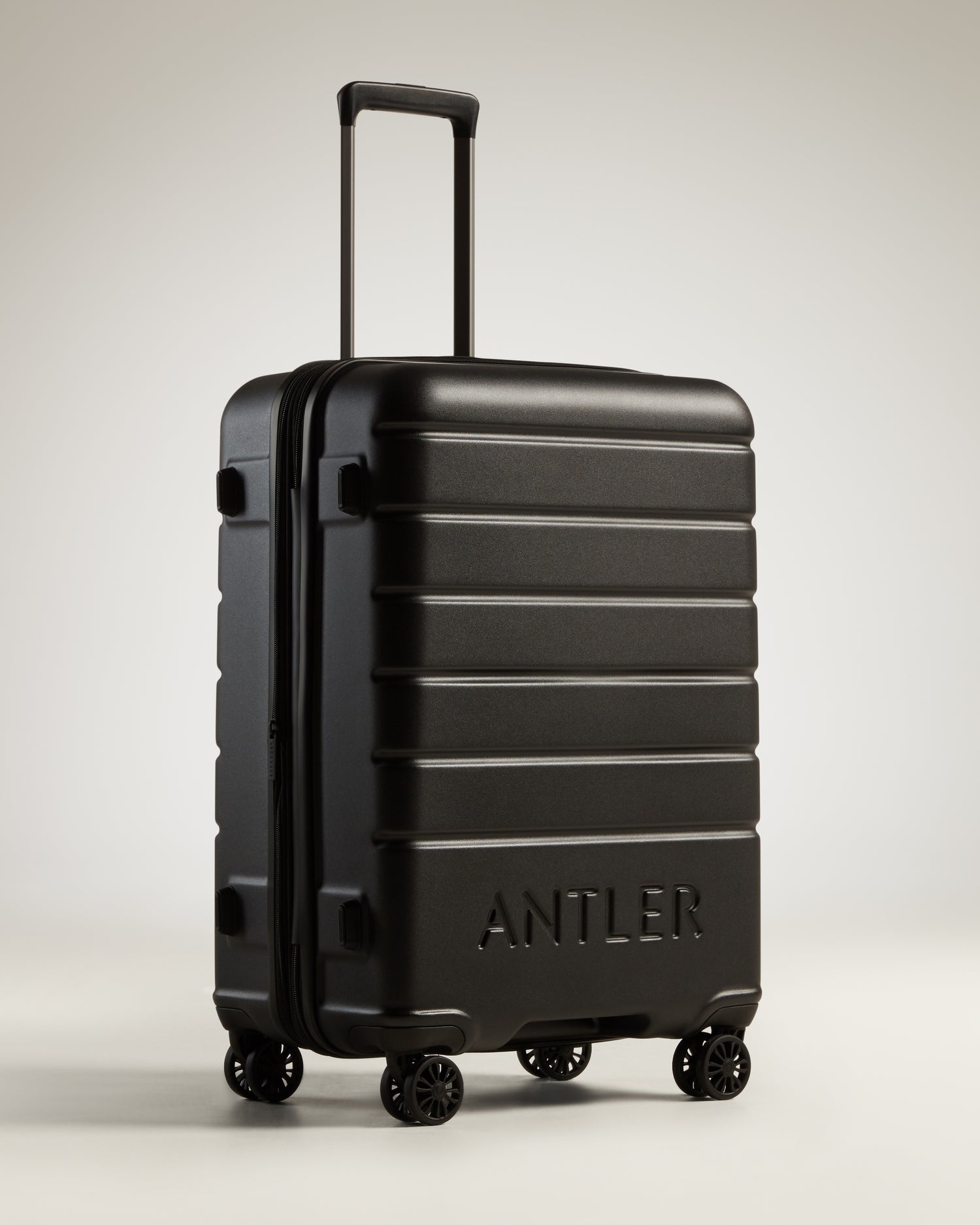 Medium Luggage in Black - Logo